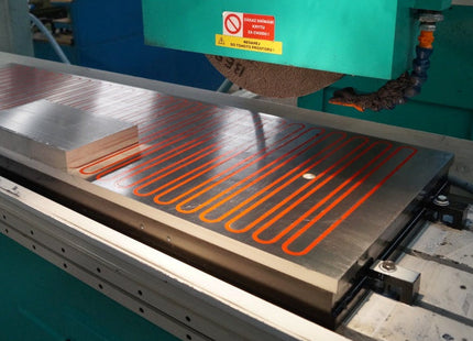 The Elmag Compact electromagnetic plate chuck is for surface grinding